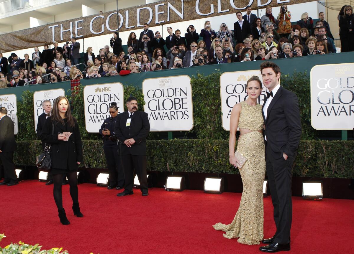 John Krasinski introduced his 4-month-old daughter Hazel on Twitter. "The Office" star and wife Emily Blunt welcomed the baby girl in February. Above, the couple at the 2013 Golden Globes.