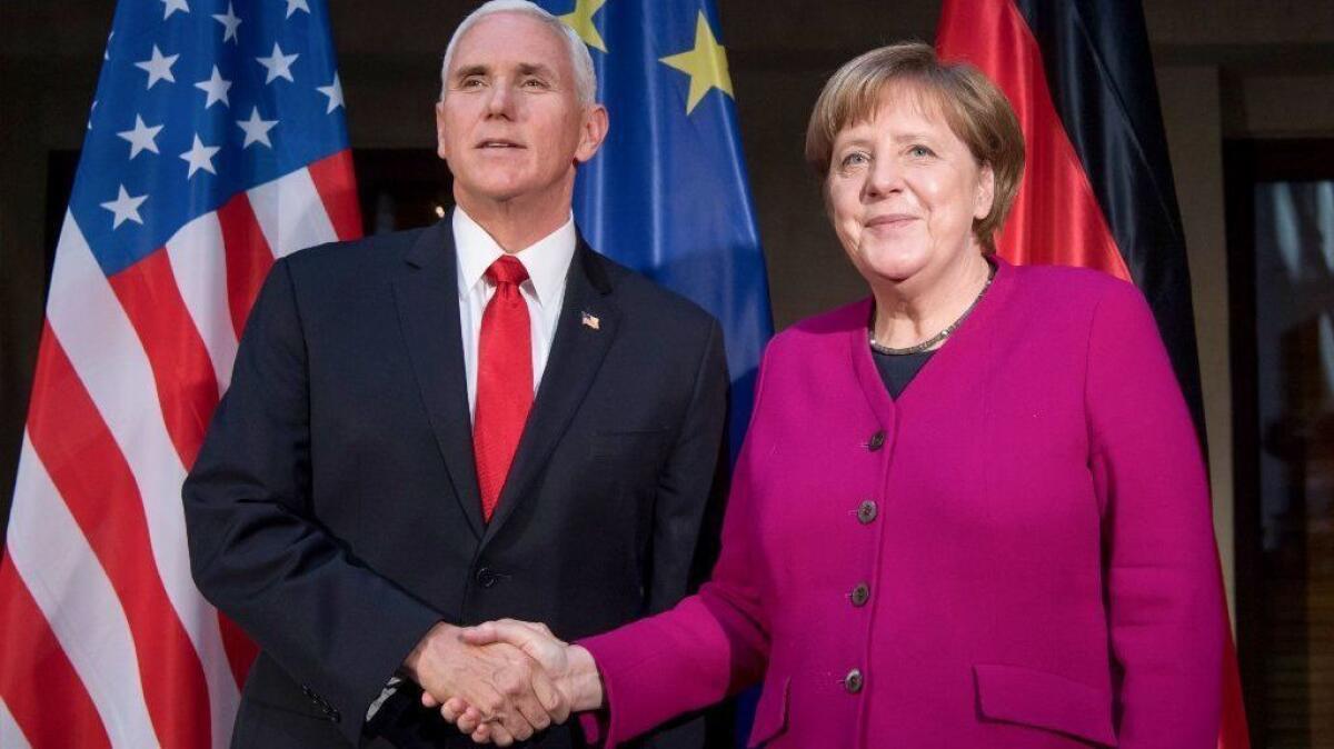 German Chancellor Angela Merkel and Vice President Mike Pence at the Munich Security Conference on Feb. 16.