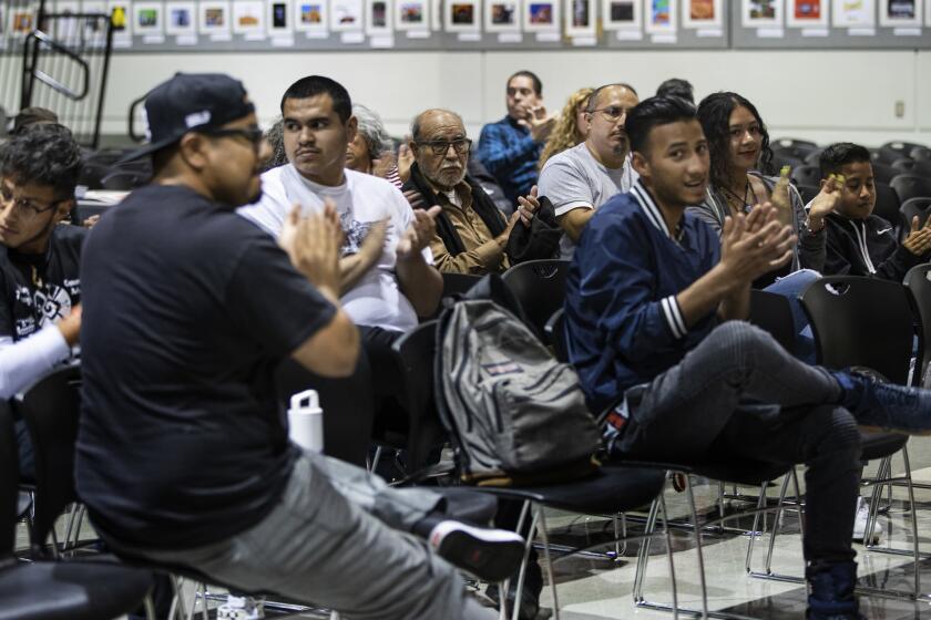 LOS ANGELES, CA - MAY 24, 2019:Young and older members of the Mexican American student organization MEChA gather to discuss the future of the organization at Dr.Maya Angelou High School on May 24, 2019 in Los Angeles, California. The younger generation wants to drop some name changes. The Mexican American student organization MEChA (Movimiento Estudiantil Chicanx de Aztlan) was founded in the late 60's during the Chicano and civil rights movements. The proposed name change has sparked a multi-generational debate over identity, inclusivity and the history of those terms. (Gina Ferazzi/Los AngelesTimes)