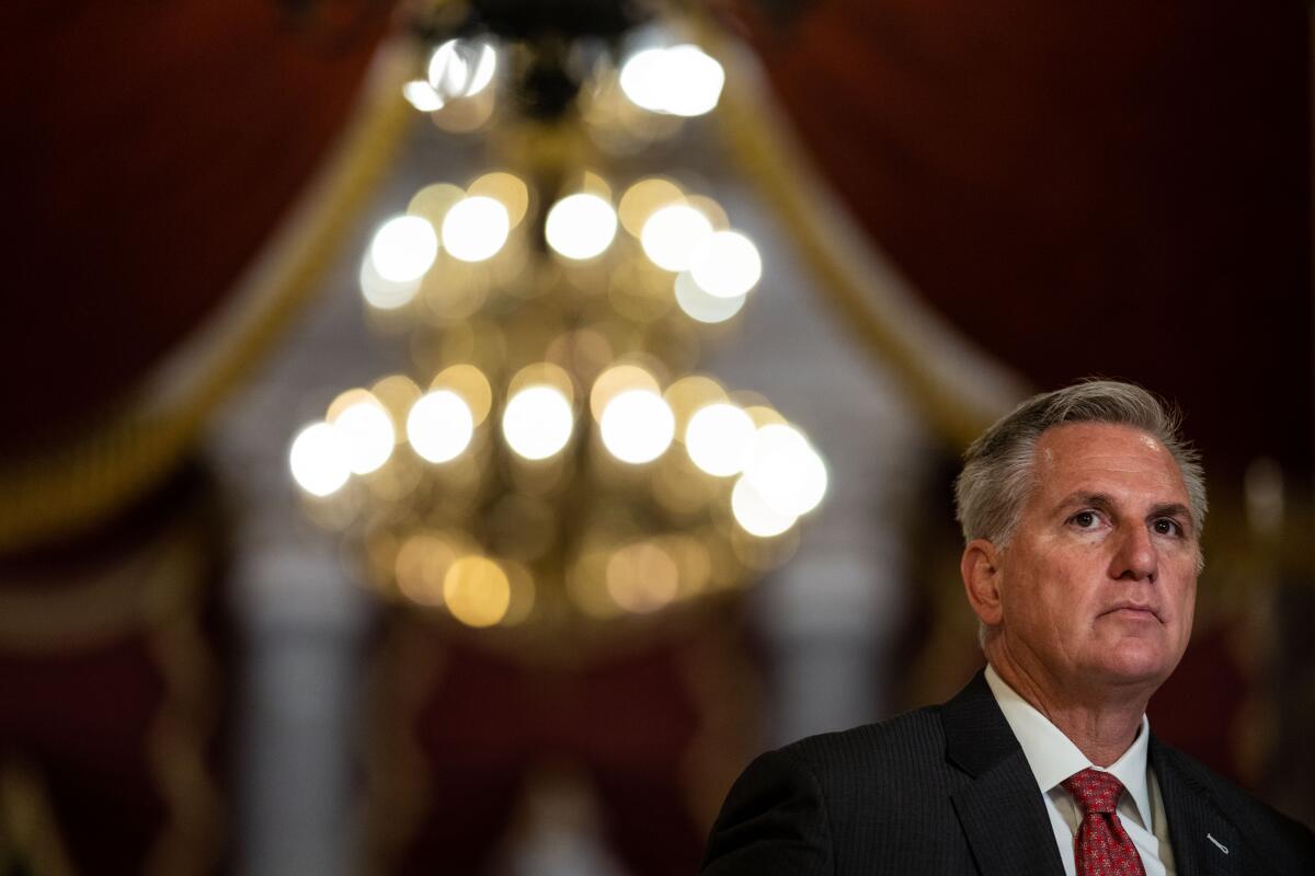 Kevin McCarthy during a TV interview with a chandelier in the background