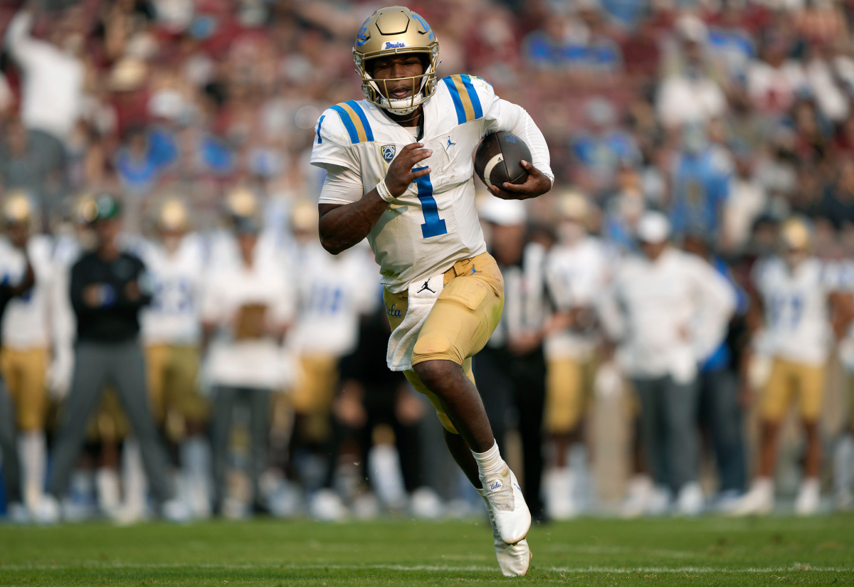 UCLA quarterback Dorian Thompson-Robinson runs for a two-yard touchdown in the second quarter against Stanford.