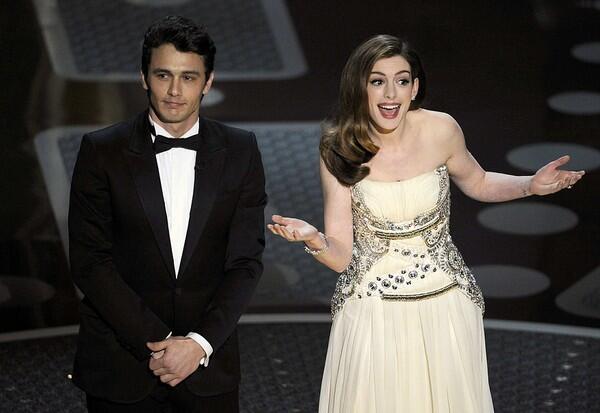 We might have missed the beginning of the subtle opening to the 83rd Academy Awards, but it isn't our fault. When the commercials ended and the movie countdown peppered with the films began, it took us a second to realize the show started. Then hosts James Franco and Anne Hathaway finally made an appearance -- inserted into Alec Baldwin's dream, an elevator with Morgan Freeman and in the Oscar-nominated films thanks to the magic of television. We loved Franco and Hathaway's Lowell accents from "The Fighter" and the brown duck spoof had us actually laughing out loud. Related: - Academy Awards 2011: Behind the scenes - 'The King's Speech': The triumph of Hollywood conservative values - Academy Awards 2011: Red carpet arrivals - Six artists present their takes on the Oscars - Academy Awards 2011: Scene and heard - Kirk Douglas' laughs and Melissa Leo's gaffe - Oscars: Technology puts everyone on stage