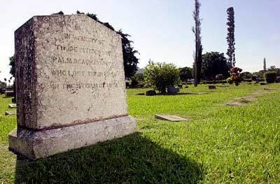 A marker at Woodlawn Cemetery in West Palm Beach memorializes victims of the 1928 hurricane. White victims were buried in the cemetery while black victims were buried in a mass grave at the corner of Tamarind Avenue and 25th Street.