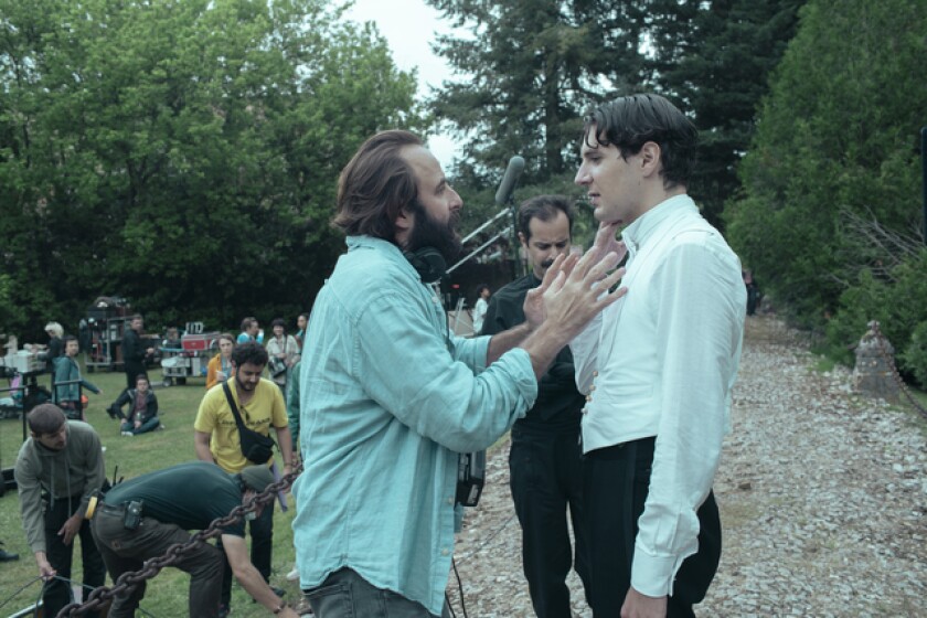 A filmmaker berates an actor on set