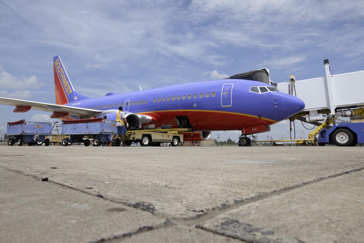 A Southwest Boeing 737 at Bill and Hillary Clinton National Airport in Little Rock, Ark., last month. Southwest is the largest operator of the 737 Max, which has been grounded since March.