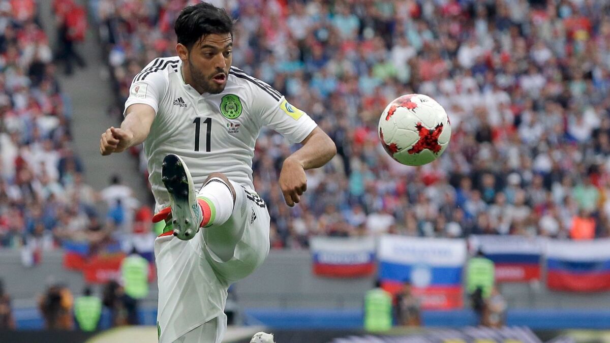 Mexico's Carlos Vela plays the ball during a Confederations Cup match against Russia on June 24.