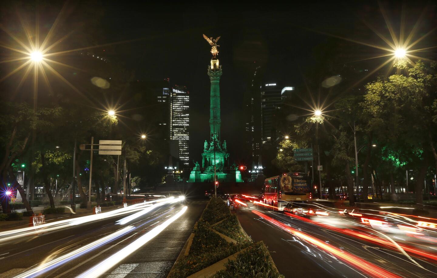 Cities glow green in support of Paris climate agreement