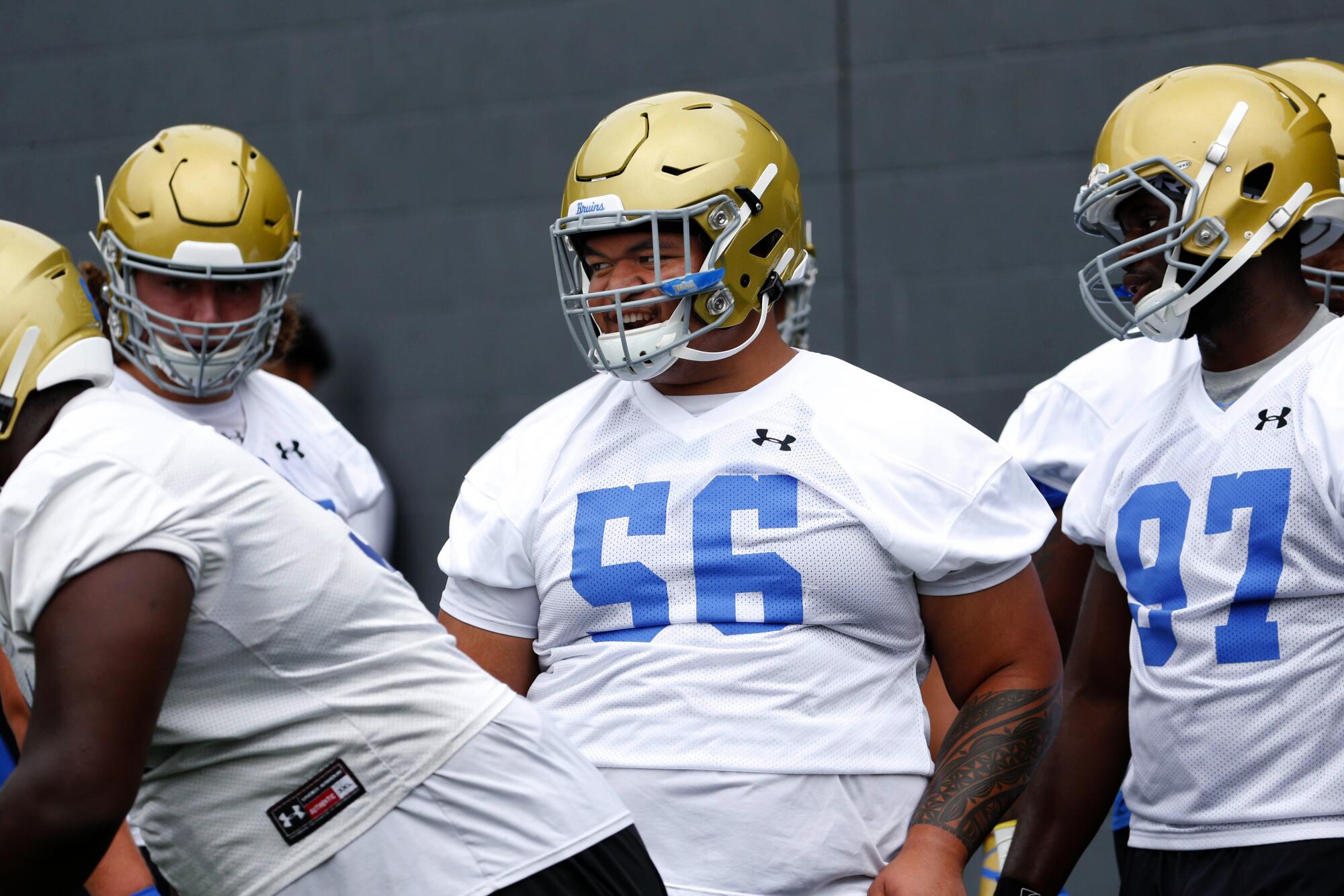 UCLA offensive lineman Atonio Mafi takes part in Bruins training camp.