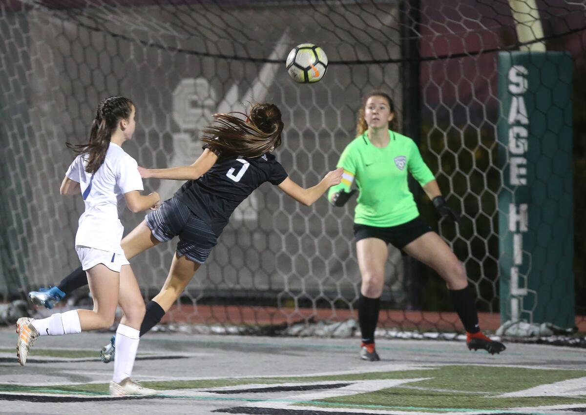 Sage Hill's Lexi Van den Bosch (5) nearly heads the ball in for a goal against Pacifica Christian on Jan. 7, 2020.
