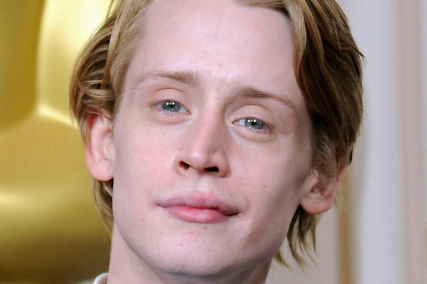 Macaulay Culkin backstage at the 82nd Academy Awards in 2010.