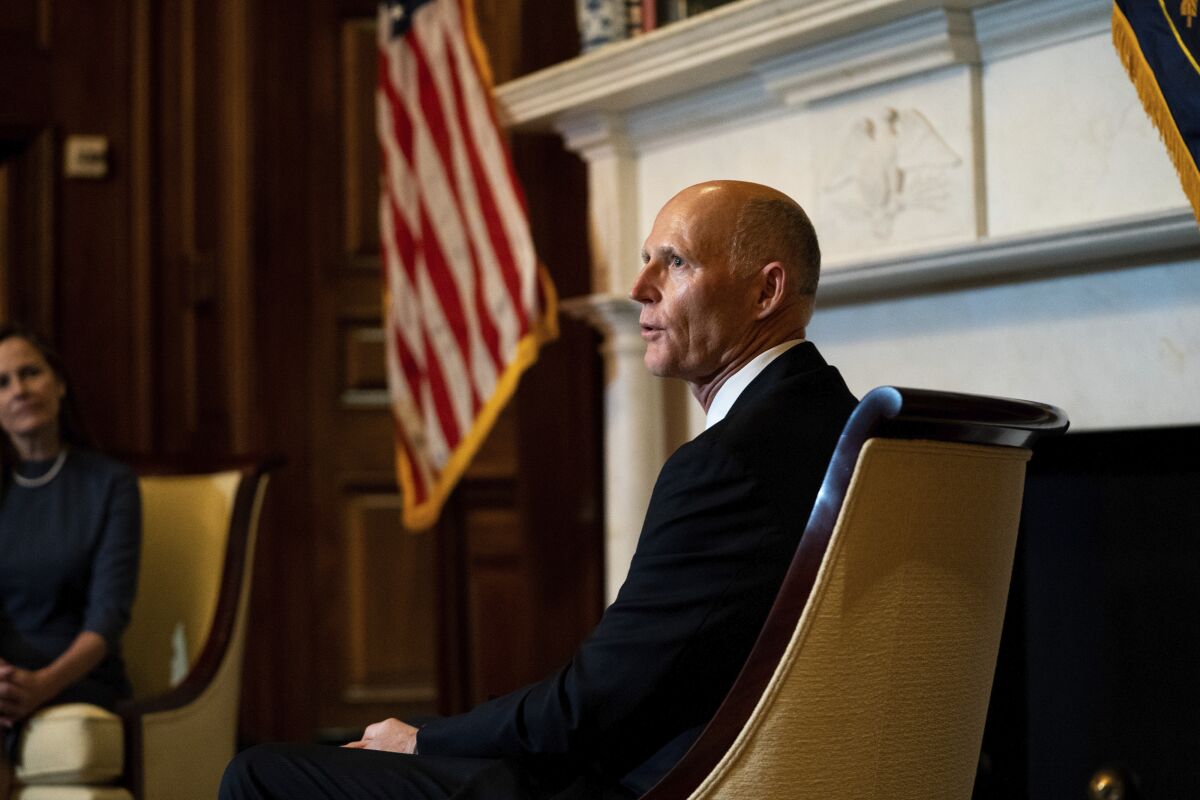 Sen. Rick Scott, R-Fla., right, meets with Judge Amy Coney Barrett, President Donald Trumps nominee for the U.S. Supreme Court, on Capitol Hill in Washington, Tuesday, Sept. 29, 2020. (Anna Moneymaker/The New York Times via AP, Pool)