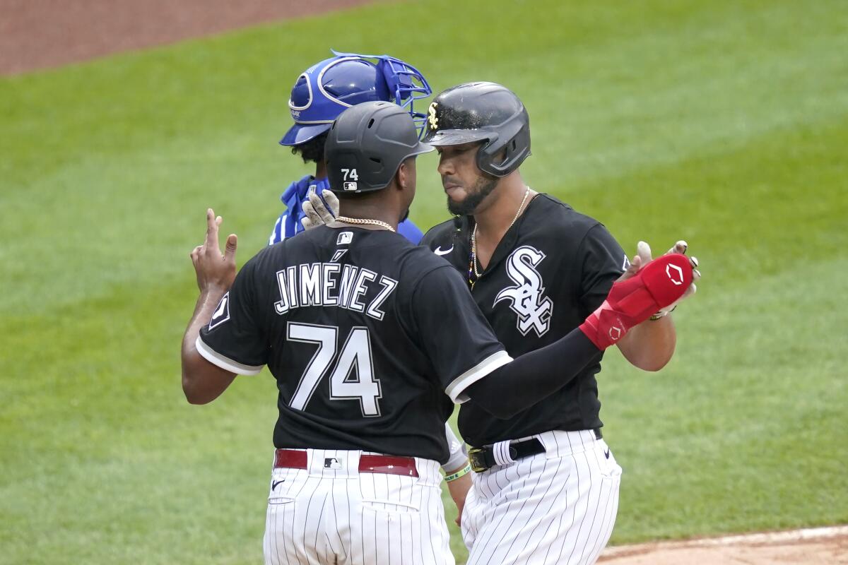 Chicago White Sox designated hitter Eloy Jimenez looks on during