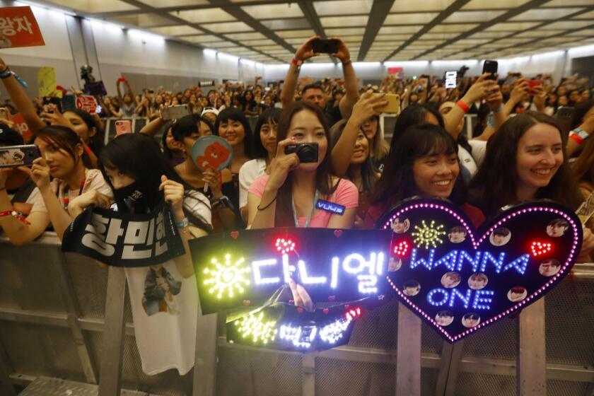 LOS ANGELES, CA AUGUST 11, 2018: Fans reacts to the KPOP performers arriving during the red carpet KCON 2018 LA at the Los Angeles Convention Center in Los Angeles, CA August 11, 2018. (Francine Orr/ Los Angeles Times)