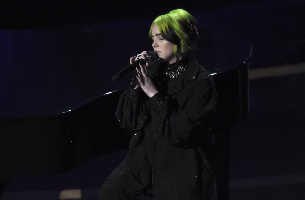 Billie Eilish performs during the In Memoriam tribute at the Oscars on Sunday.
