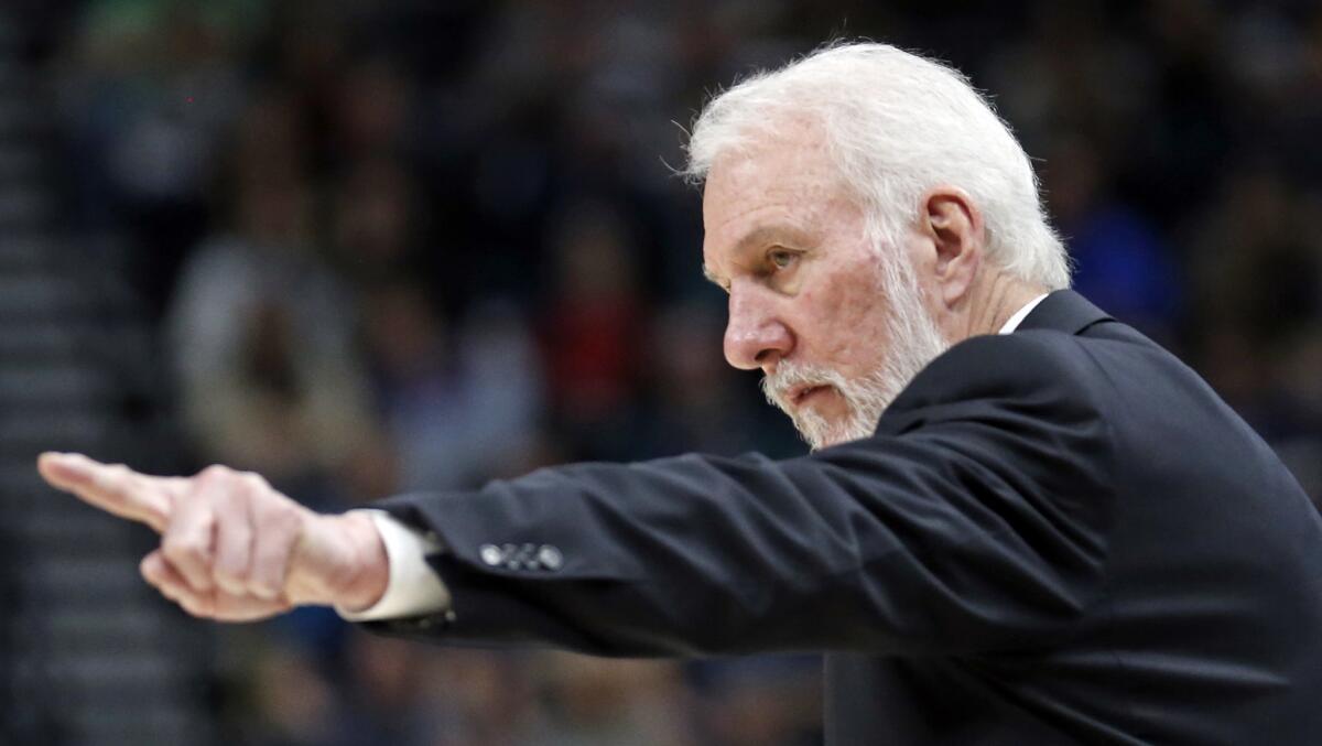 Gregg Popovich coaches the San Antonio Spurs during a game against the Utah Jazz on Dec. 21.