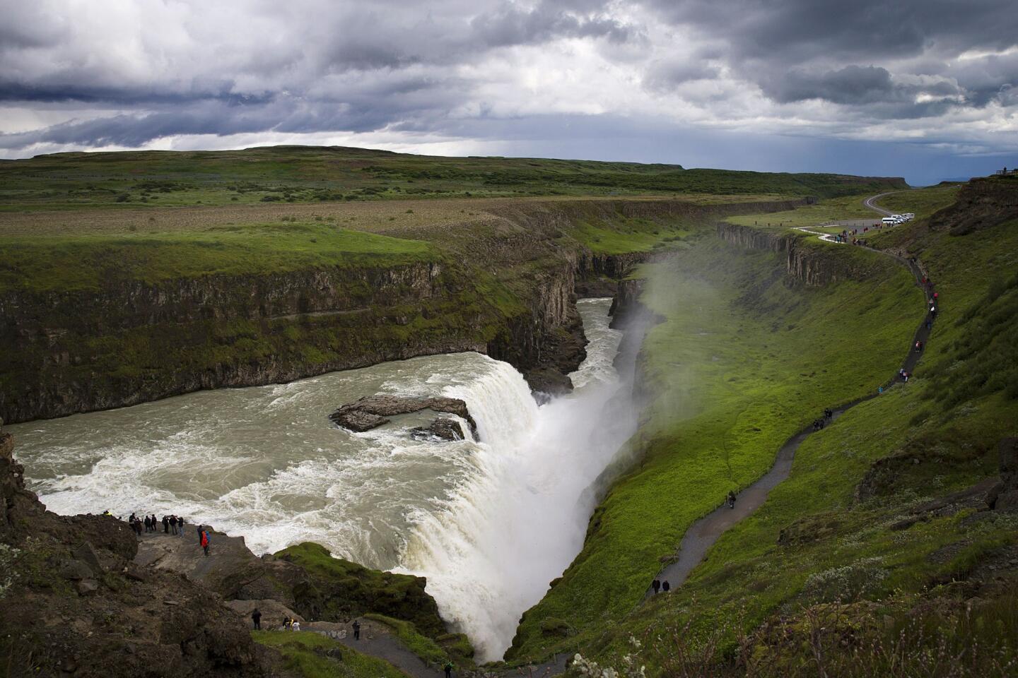The two-tiered waterfall drops about 105 feet into the Hvita River in south Iceland. On average, water flows through Gullfoss at a rate of about 29,000 gallons per second. Heavy flooding has produced as much as 530,000 gallons per second. For comparison, American and Bridal Veil Falls at Niagara Falls flow at an average rate of about 76,000 gallons per second.