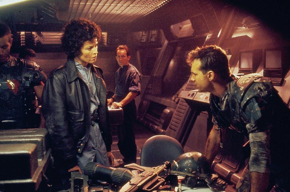 Actors Michael Biehn, Sigourney Weaver, Lance Henriksen and Bill Paxton, in a scene from the movie "Aliens," 1986.