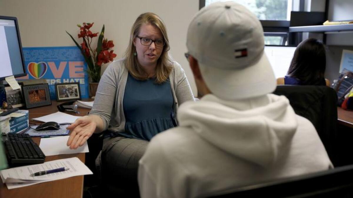 Attorney Amy Frances Barnett advises a student at the UC Immigrant Legal Services Center at UC Davis.