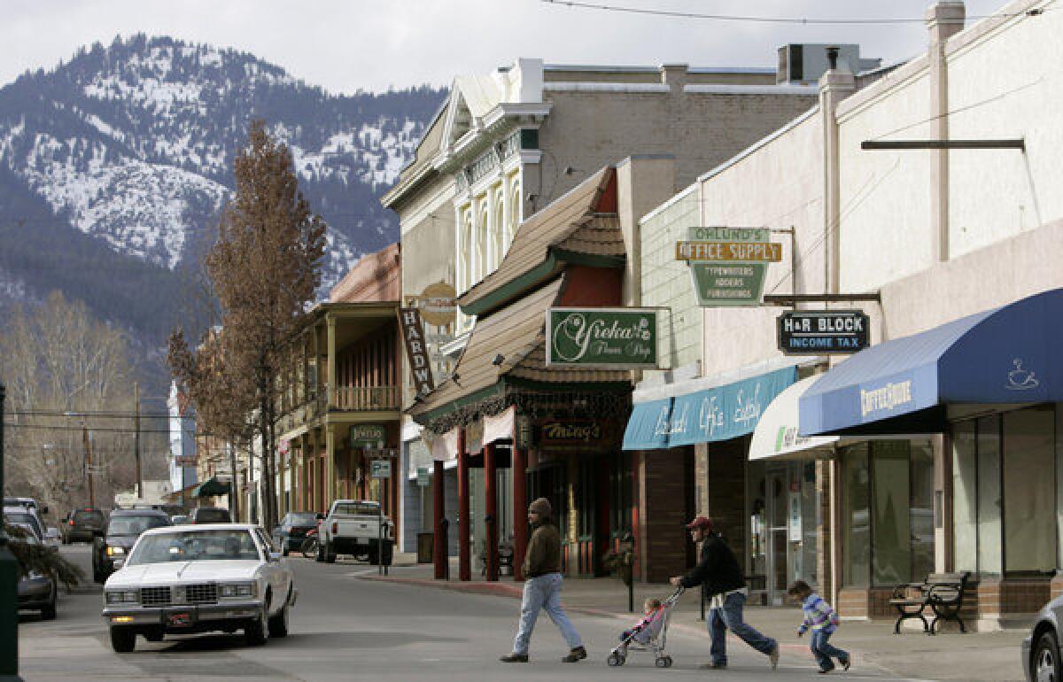 Pedestrians cross Miner Street in Yreka, the seat of Siskiyou County, whose board of supervisors voted, 4-1, on Tuesday to pursue seceding from California.
