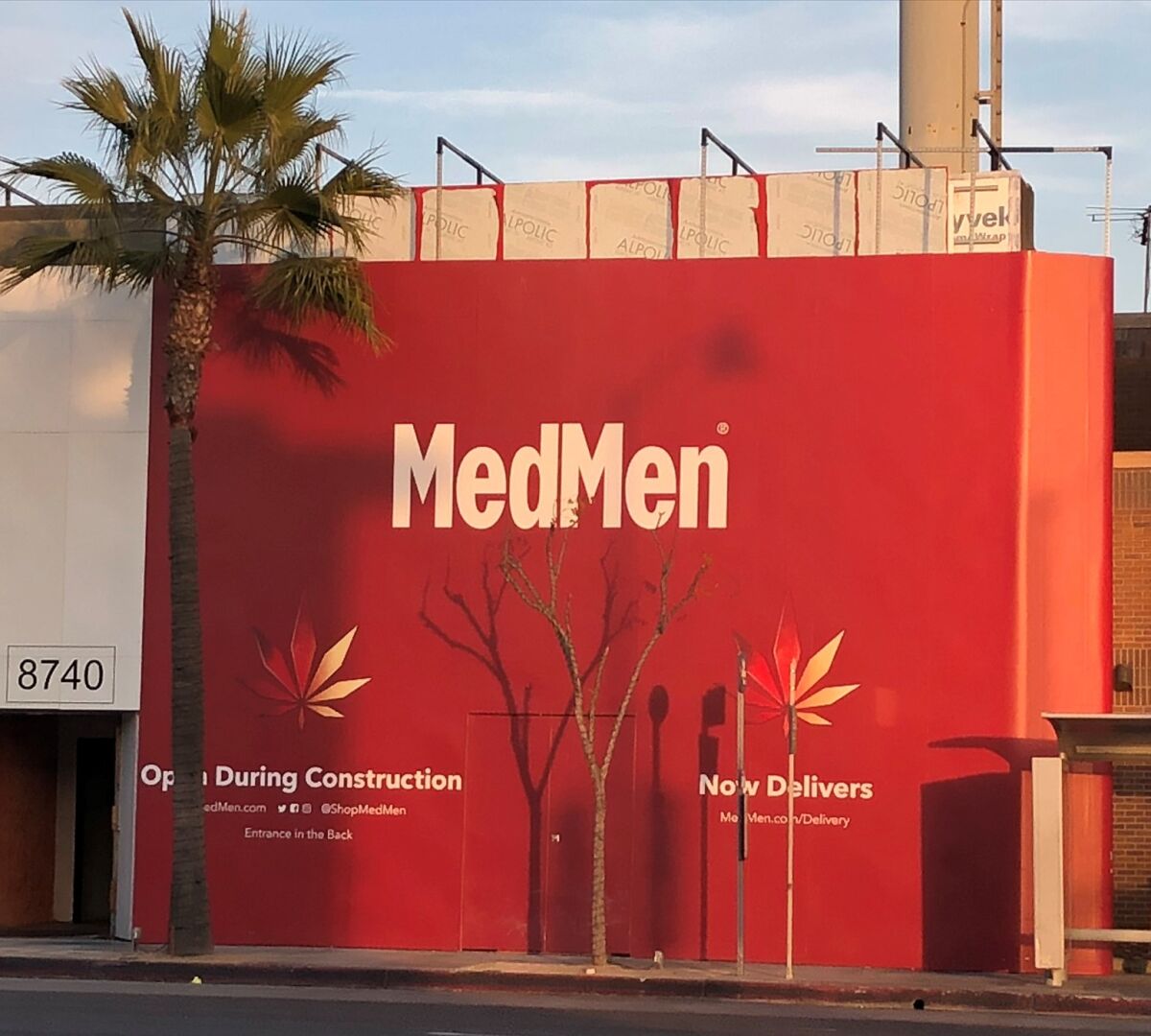 A red wall that says "MedMen" at 8740 S. Sepulveda Blvd.