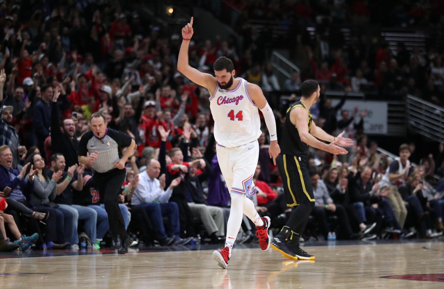 Nikola Mirotic reacts after hitting a 3-pointer in the second half against the Lakers at the United Center on Jan. 26, 2018.