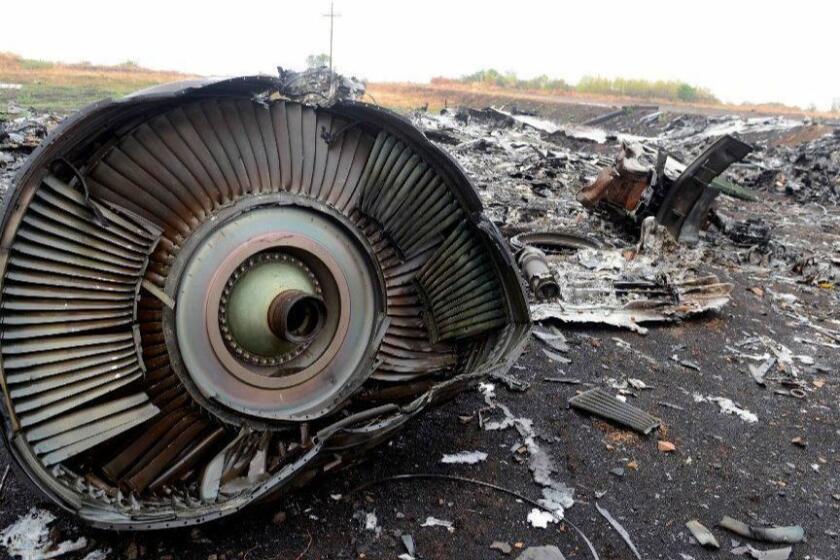 (FILES) In this file photo taken on September 09, 2014 shows part of the Malaysia Airlines Flight MH17 at the crash site in the village of Hrabove (Grabovo), some 80km east of Donetsk. Moscow on May 24, 2018 rejected an international investigation that found a Russian missile downed flight MH17 over Ukraine in 2014, saying no such weapon had ever crossed the Russian-Ukrainian border. "Not a single anti-aircraft missile system from the Russian Federation has ever crossed the Russia-Ukraine border," the defence ministry said in a statement carried by news agencies. / AFP PHOTO / Alexander KHUDOTEPLYALEXANDER KHUDOTEPLY/AFP/Getty Images ** OUTS - ELSENT, FPG, CM - OUTS * NM, PH, VA if sourced by CT, LA or MoD **