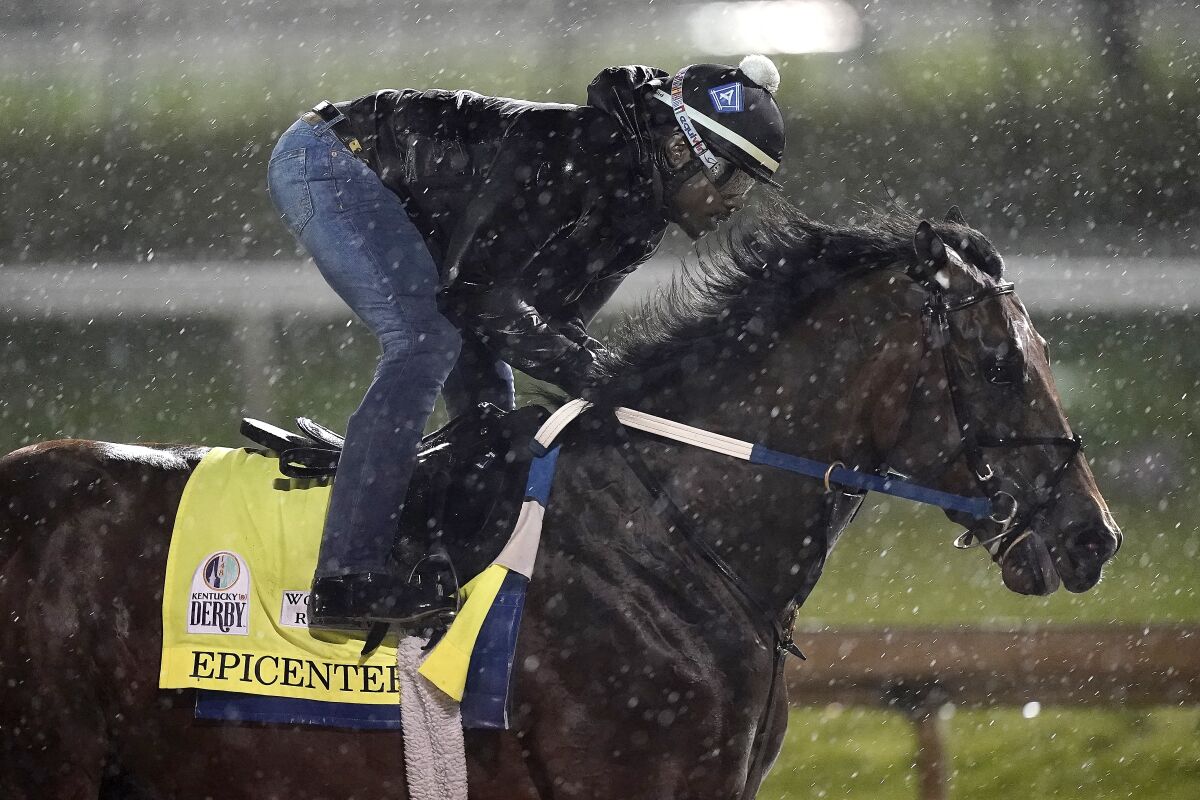 Kentucky Derby entrant Epicenter works out in the rain May 3 at Churchill Downs.