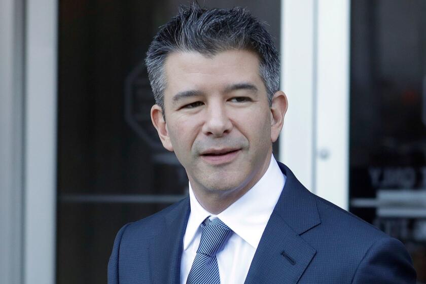 Former Uber CEO Travis Kalanick leaves federal court in San Francisco, Wednesday, Feb. 7, 2018. (AP Photo/Jeff Chiu)