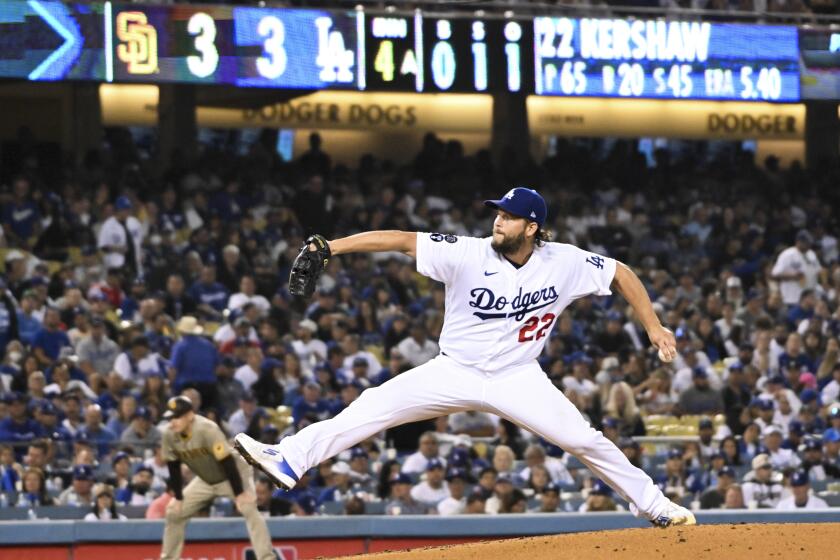 Los Angeles, CA - October 12: Los Angeles Dodgers starting pitcher Clayton Kershaw delivers a pitch during the third inning in game two of the NLDS against the San Diego Padres at Dodger Stadium on Wednesday, Oct. 12, 2022 in Los Angeles, CA.(Wally Skalij / Los Angeles Times)