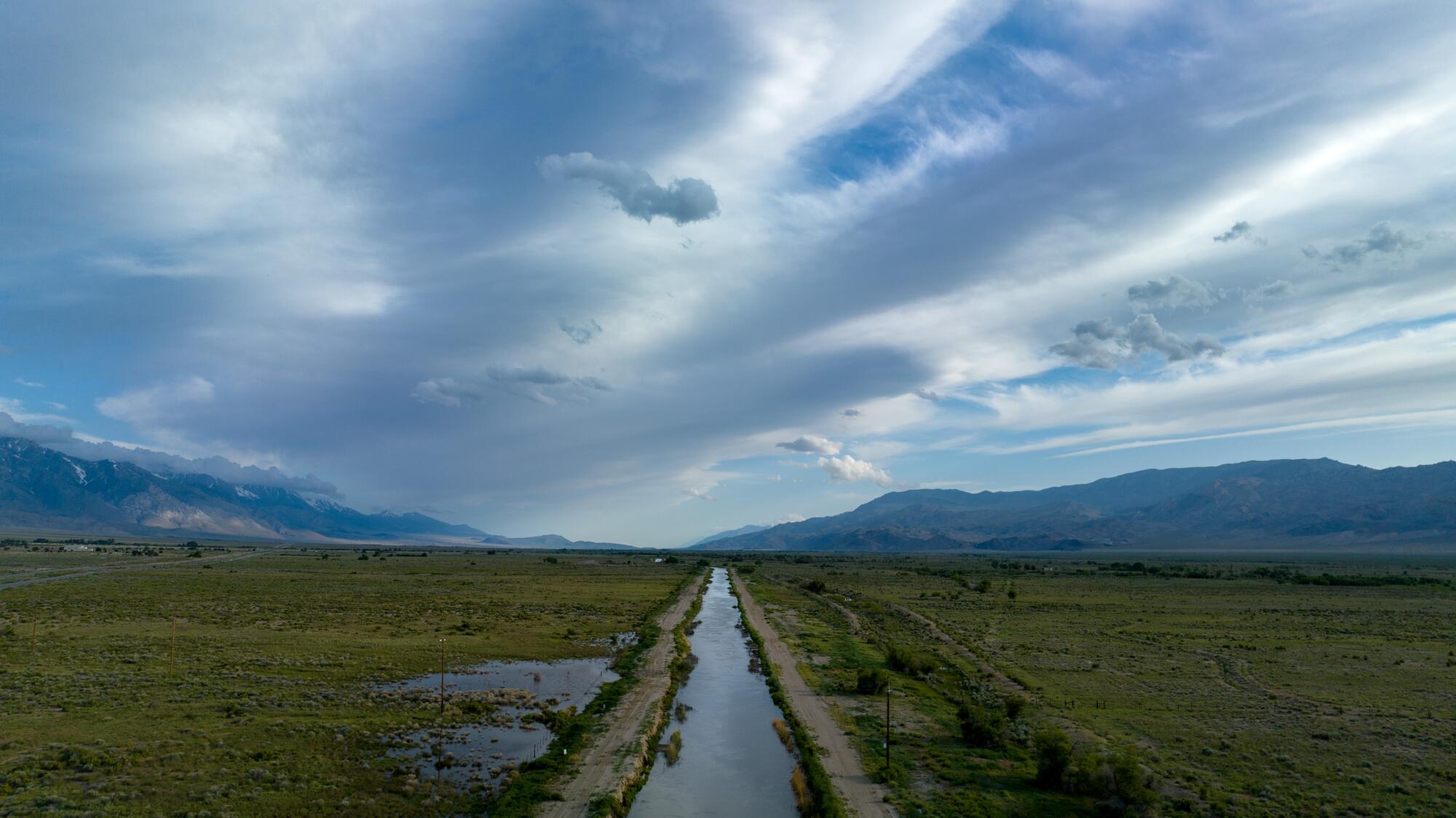 The Los Angeles Aqueduct flows south through the Owens Valley.