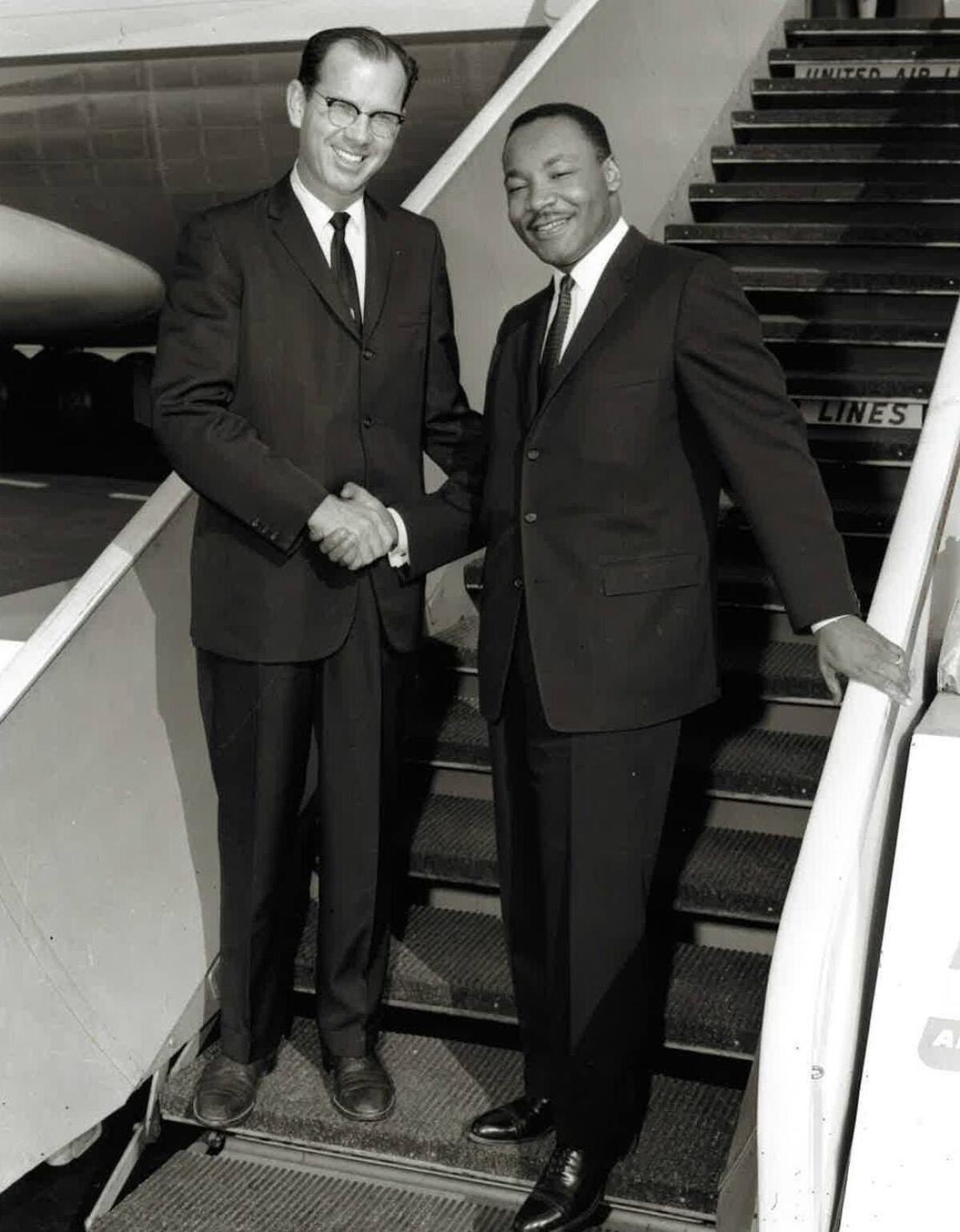 Los Angeles County Supervisor Kenneth Hahn meets Dr. Martin Luther King Jr. on the tarmac of LAX in 1961.