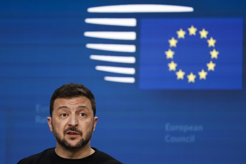 Ukraine's President Volodymyr Zelenskyy talks to journalists during a press conference at an EU summit in Brussels, Thursday, Oct. 17, 2024. (AP Photo/Omar Havana)