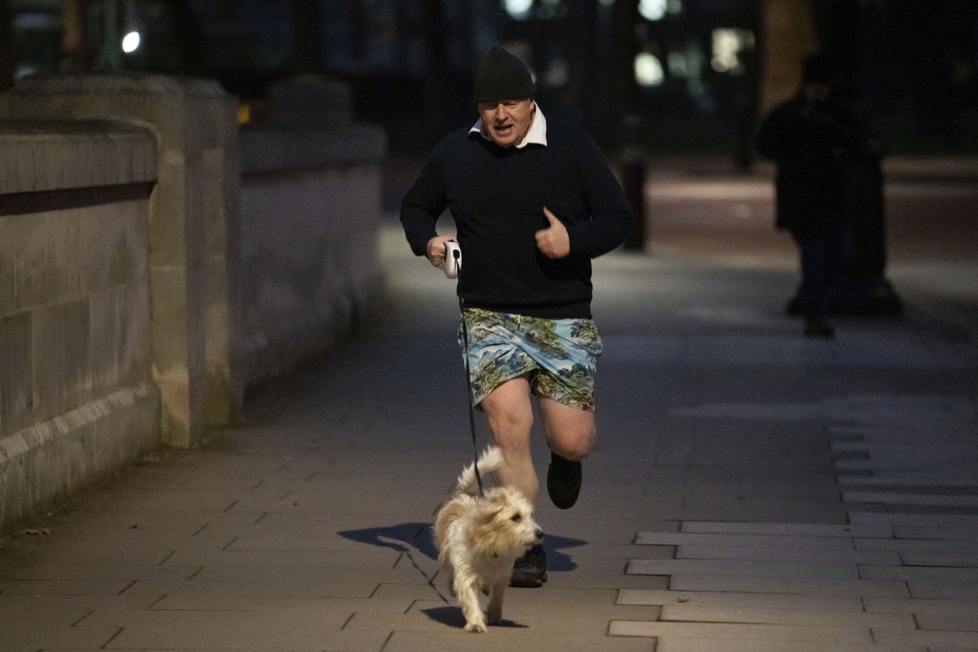 Prime Minister Boris Johnson jogs in central London in 2022.