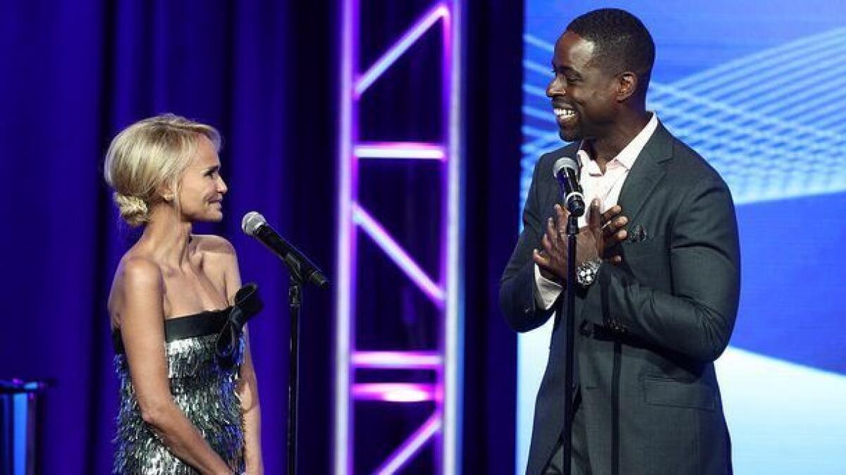 Host Kristin Chenoweth and Sterling K. Brown of "This Is Us" perform at the 33rd Television Critics Assn. awards Saturday at the Beverly Hilton.