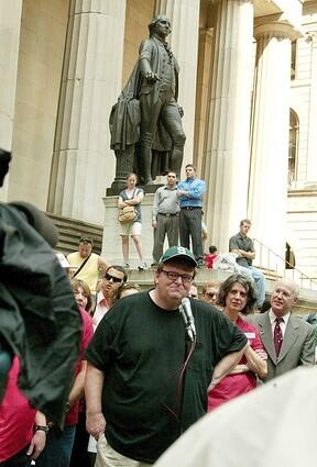 Michael Moore So the European backpackers will talk to me. Otherwise, my Americanism will keep me confined to backpacking with other Americans, which total two people in most Asian countries. Risk: His incessant preaching about various ailings of American society, how France beats Flint any day, etc.