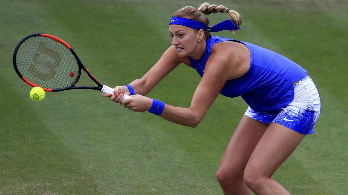 Petra Kvitova returns a shot against Lucie Safarova during their semifinal match at the Aegon Classic on Saturday.