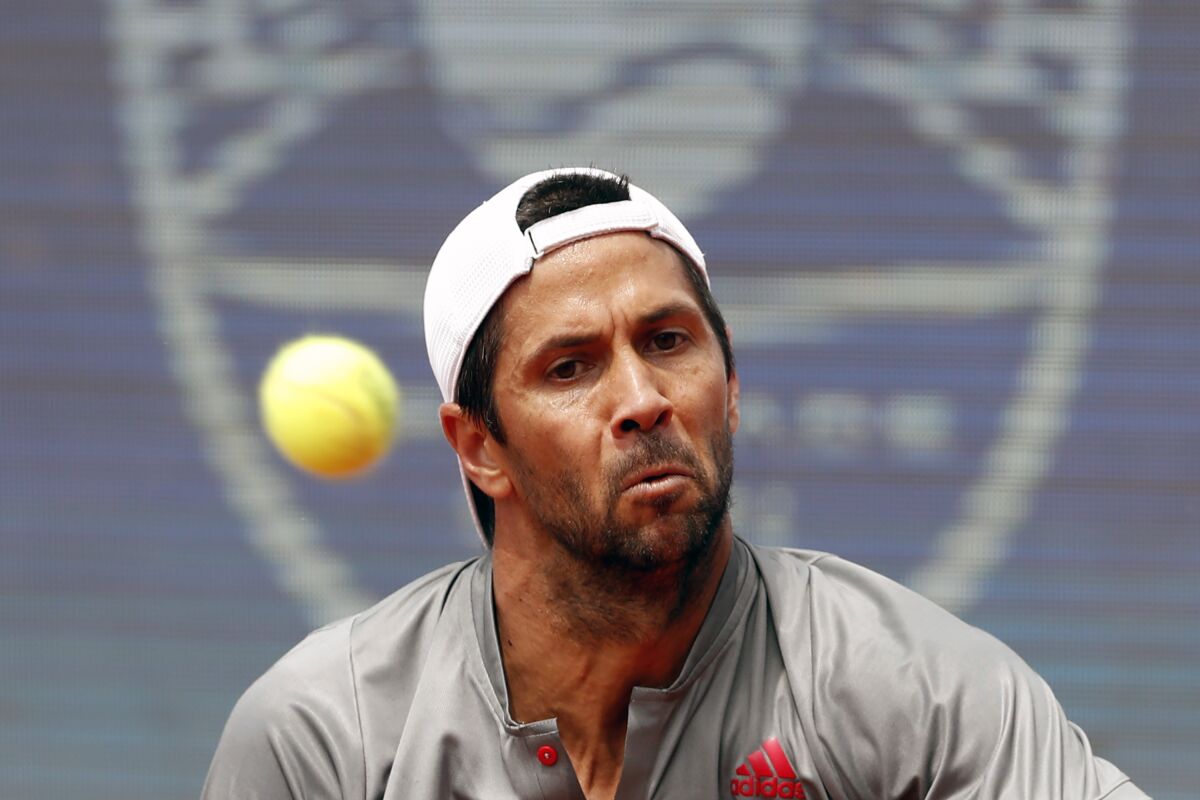 FILE - Fernando Verdasco of Spain returns a ball to Alex Molcan of Slovakia during their tennis match at the Belgrade Open tennis tournament in Belgrade, Serbia, Thursday, May 27, 2021. Former top-10 professional tennis player Fernando Verdasco accepted a voluntary provisional doping suspension of two months after testing positive for a medication for ADHD, the International Tennis Integrity Agency announced Wednesday, Nov. 30, 2022. (AP Photo/Darko Vojinovic, File)