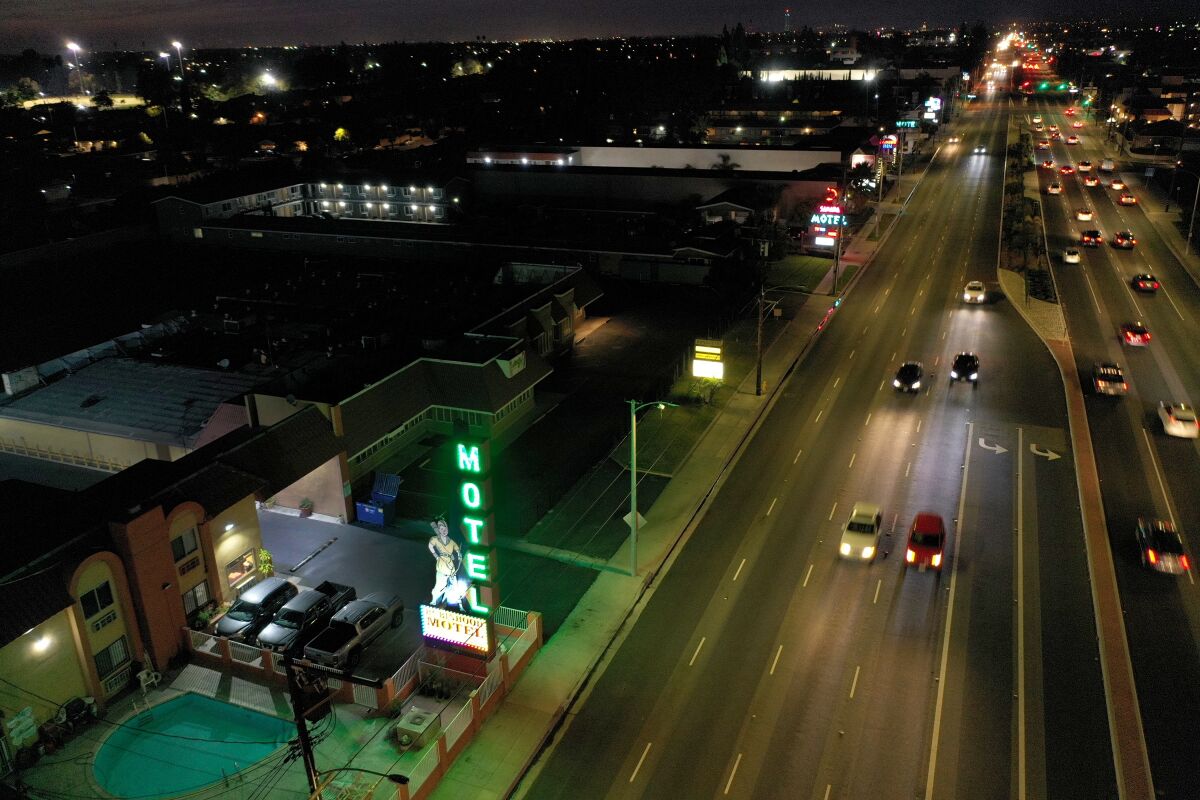 An aerial frame of nighttime traffic on Beach Boulevard