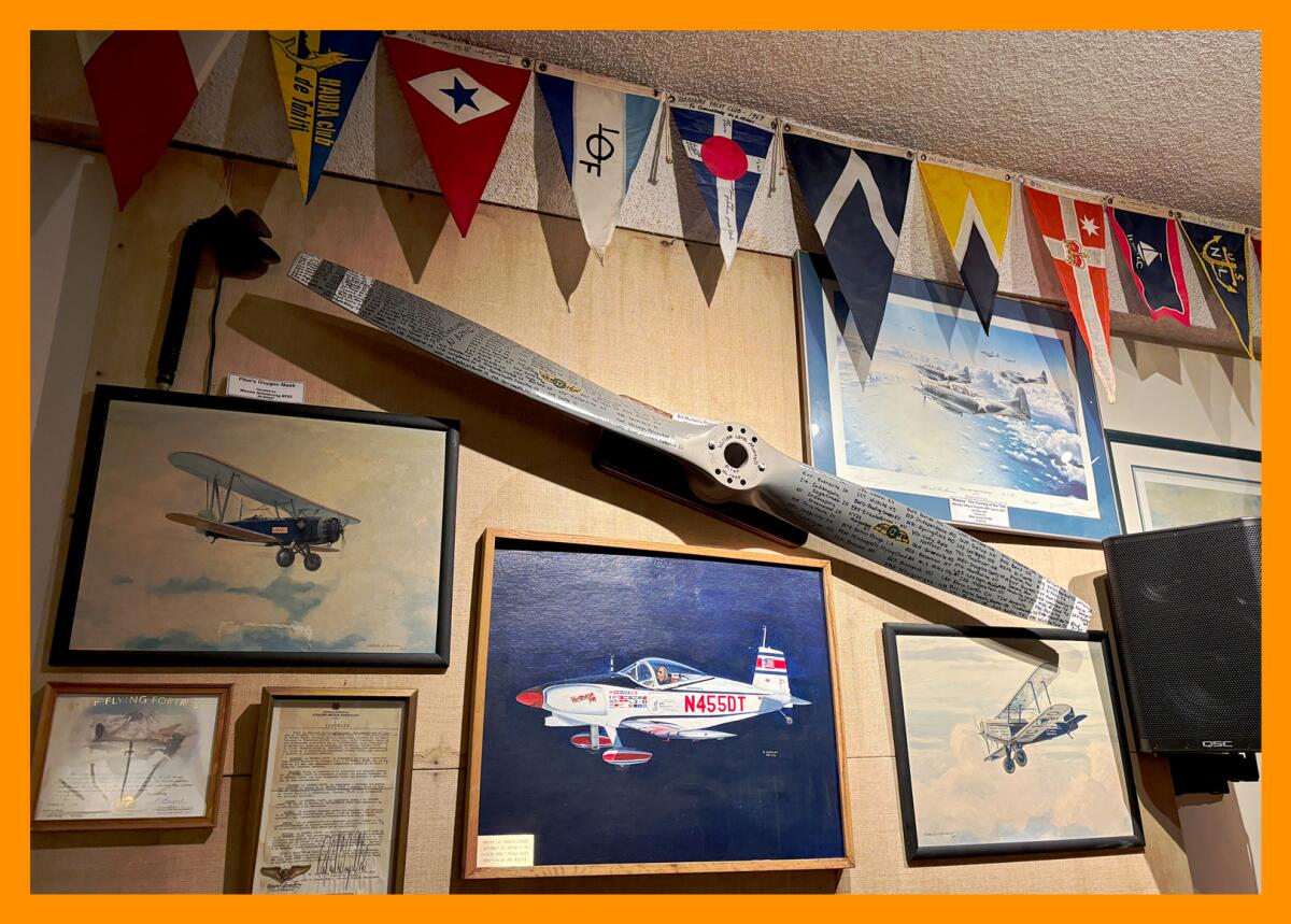 A plane propeller hung on the wall at The Adventurer's Club.