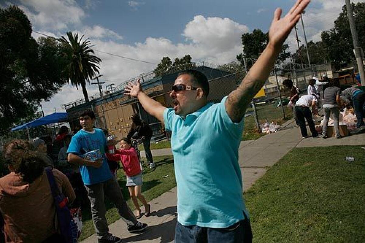 Alfred Lomas arrives at the Pueblo del Rio housing project in South Los Angeles. It is not so much the ex-gang members food program that has drawn the attention of civic leaders, but how he builds a renewed sense of community. Multimedia >>>