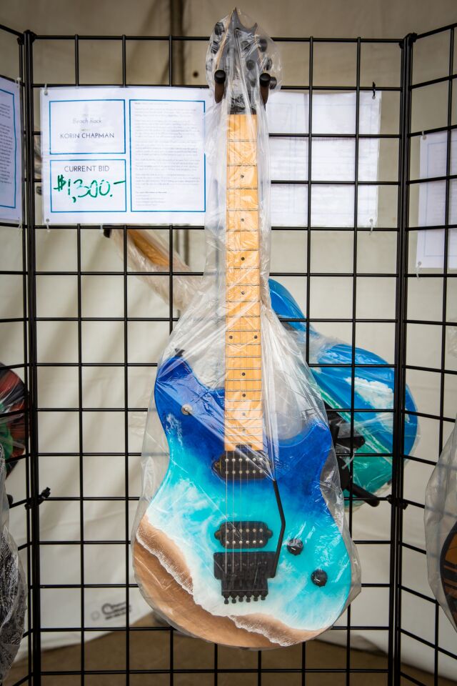This year's ArtWalk @ Liberty Station featured an art guitar auction including 30 EVH Wolfgang Standard electric guitars by the late Eddie Van Halen that were designed by participating artists.