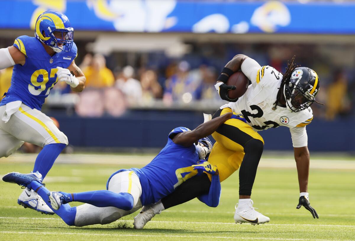 Rams safety Jordan Fuller tries to bring down Pittsburgh Steelers running back Najee Harris in the first quarter.