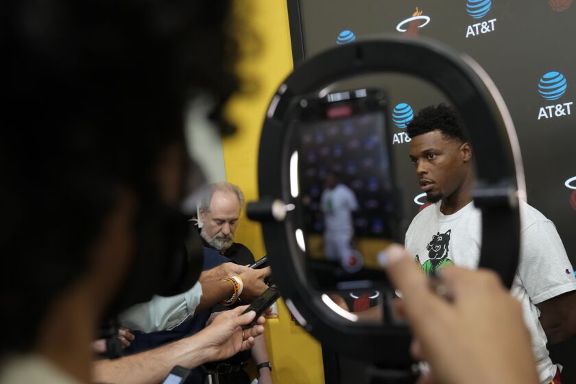 Miami Heat's Kyle Lowry talks to journalists during the NBA basketball team's Media Day in Miami, Monday, Sept. 26, 2022. (AP Photo/Rebecca Blackwell)