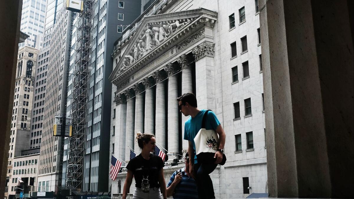 The Dow Jones industrial average fell 144.23 points, or 0.6%, to 25,306.83 on Monday, Above, the New York Stock Exchange.