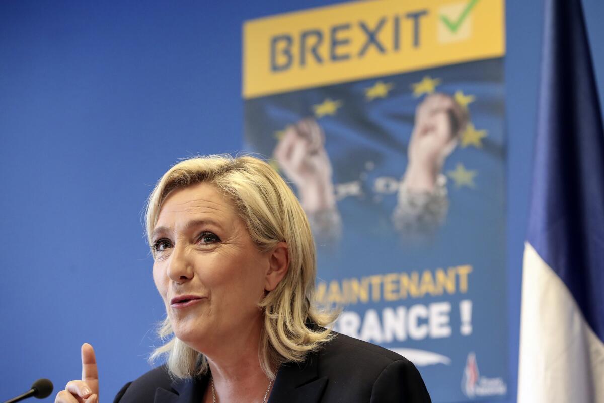 French far-right leader Marine Le Pen speaks during a news conference at the National Front party headquarters in Nanterre, outside Paris.