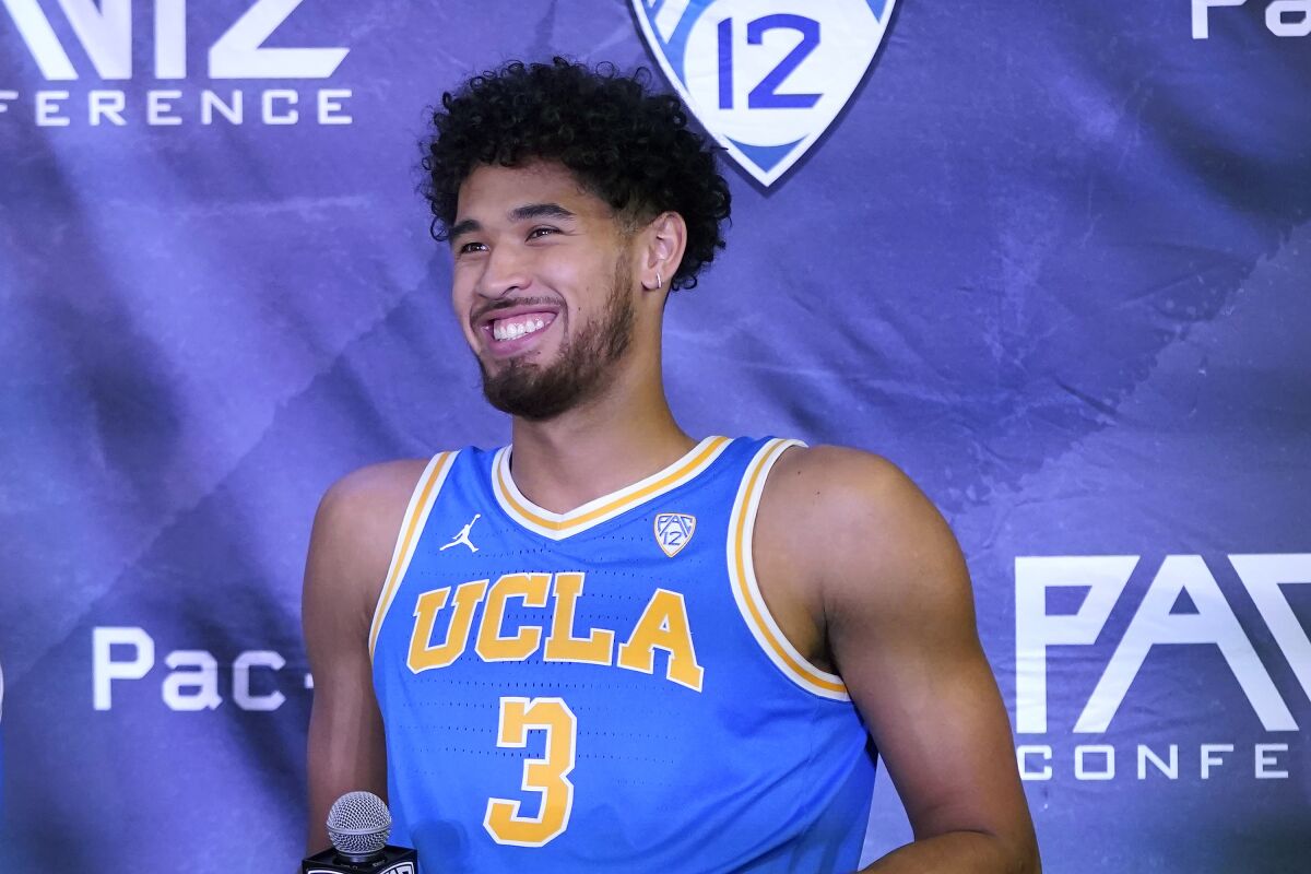 UCLA's Johnny Juzang smiles during Pac-12 Conference NCAA men's college basketball media day Wednesday, Oct. 13, 2021, in San Francisco. (AP Photo/Jeff Chiu)