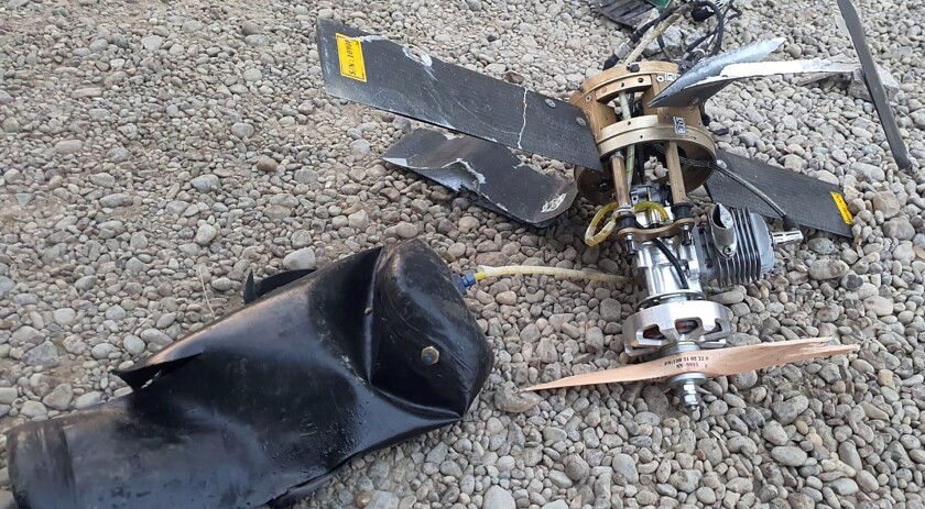 The wreckage of a drone is seen at Baghdad airport, Iraq, Monday, Jan. 3, 2022. Two armed drones were shot down at the Baghdad airport on Monday, a U.S.-led coalition official said, an attack that coincides with the anniversary of the 2020 U.S. killing of a top Iranian general. (International Coalition via AP)