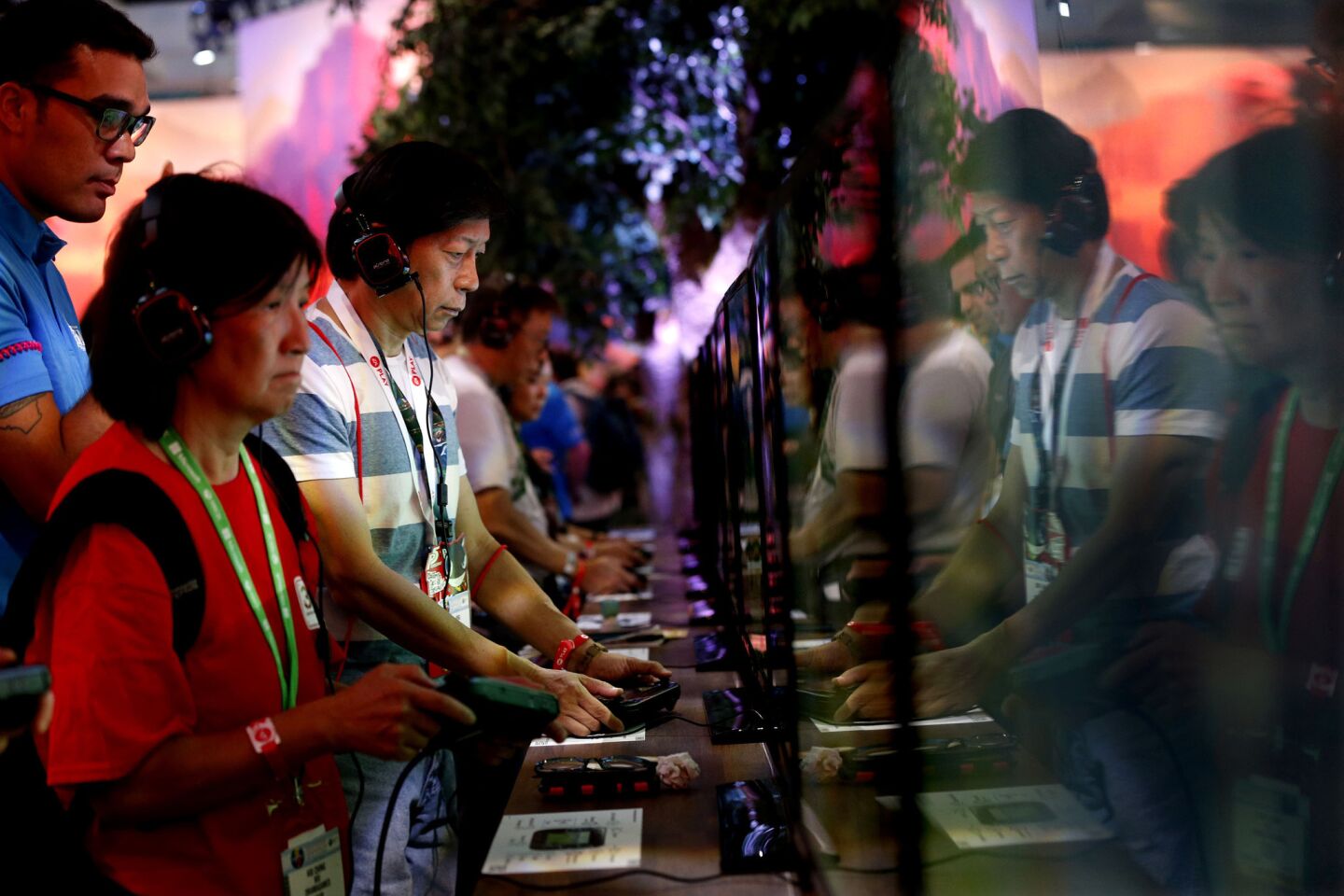 Game enthusiasts play Nintendo's "The Legend of Zelda: Breath of the Wild" during the Electronic Entertainment Expo.