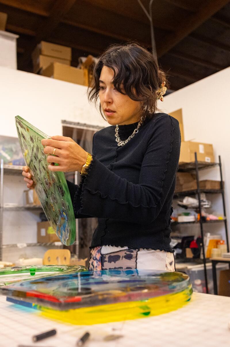 Los Angeles, CA - April 04: Artist Bailey Hikawa works in her studio on Thursday, April 4, 2024 in Los Angeles, CA. (Jason Armond / Los Angeles Times)