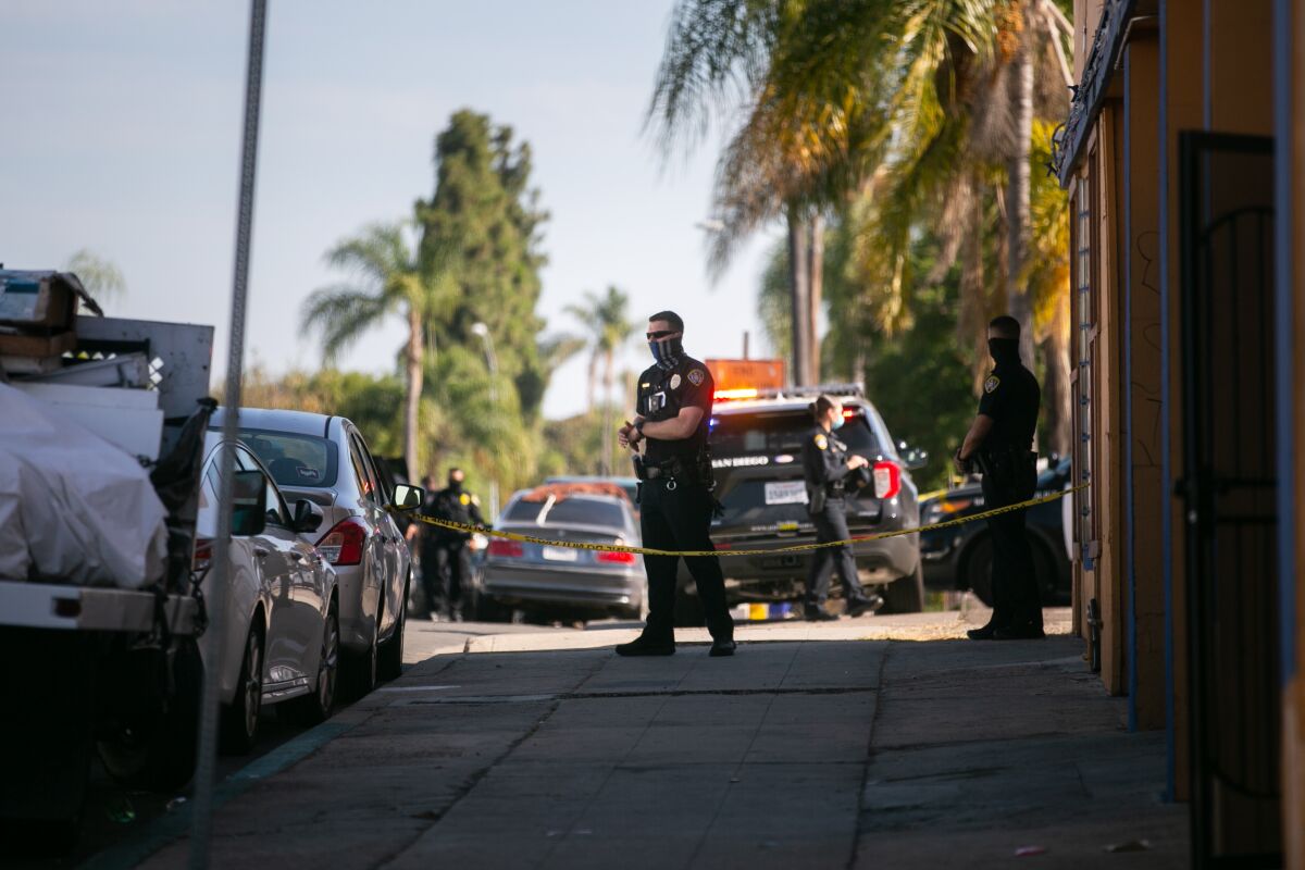 San Diego Police Department officers respond to the scene of a police shooting in City Heights.